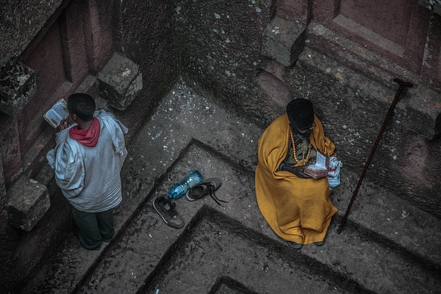 photo of two men praying in an Eithiopian church